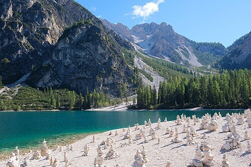 The turquoise waters of Lago di Braies (Pragser Wildsee) surrounded by the Dolomites, South Tyrol, Italy